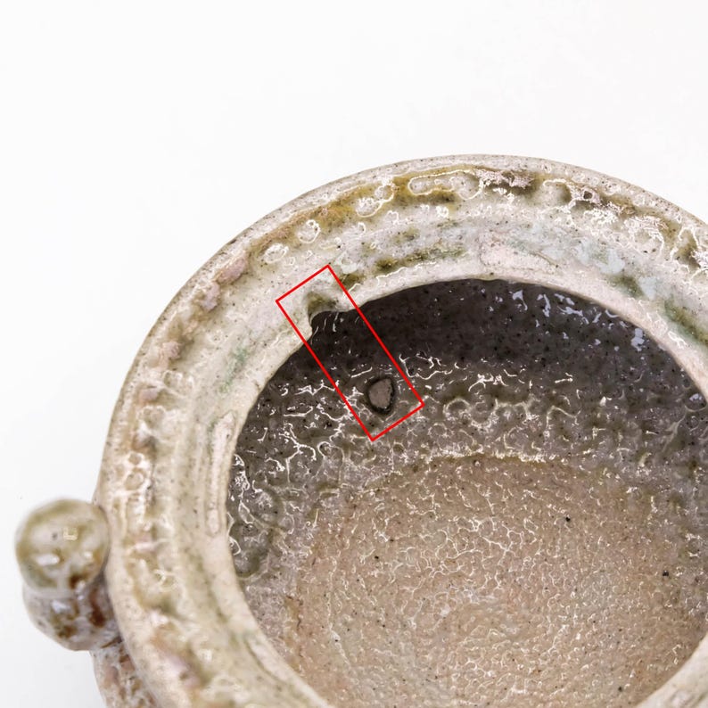 Top view of Mashiko yaki koro, open mouth incense burner with textured salt glaze surface