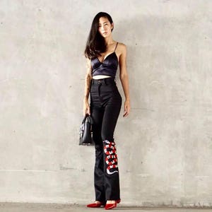 Women&#39;s Black high waisted flared bell bottoms jeans with red snake embroidered down on the side/ Vintage 70s style.