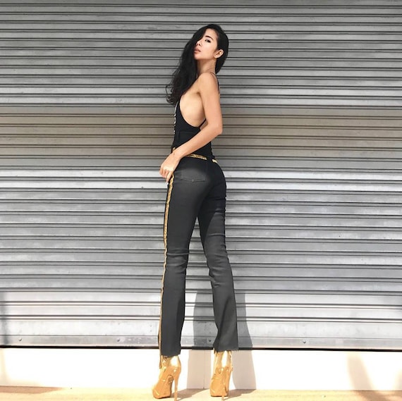 Jeans with sales gold stripe