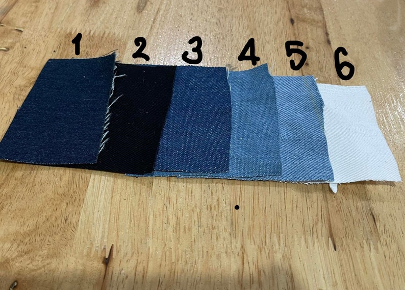 May include: Six fabric swatches in different shades of blue, black, and white. The swatches are labeled with numbers 1 through 6.