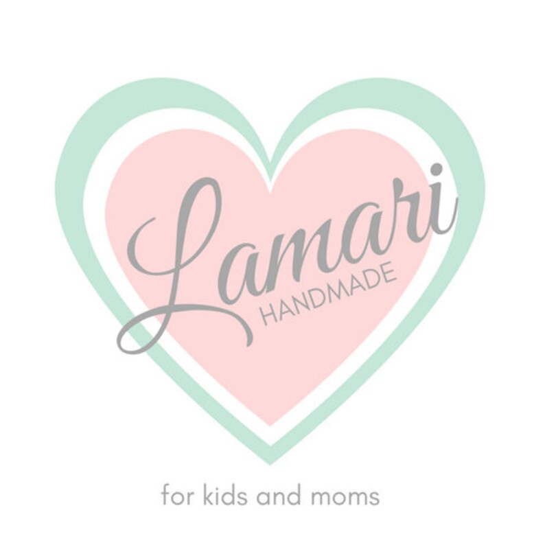 Basket of cloth-carrying diapers with pink heart.