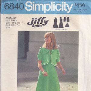 May include: Simplicity pattern 6840 for a dress and jacket. The image shows a woman wearing a green dress and matching jacket with white trim. The pattern includes sizes 10 and 12, and the bust sizes are 32.5 and 34 inches. The text "Jiffy Knits" is also visible.