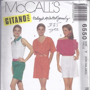 May include: McCall's sewing pattern envelope featuring three women modeling different outfits. The outfits include a white and green polo shirt and skirt, a coral-colored top and skirt, and a pink off-the-shoulder top with white shorts. The envelope has the text "GITANO".