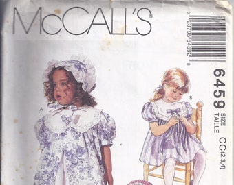 McCall's 6549 Sewing Pattern from 1993.  Toddlers Dress and Bonnet.  Breast 21-23.  Sizes 2-4  UNCUT