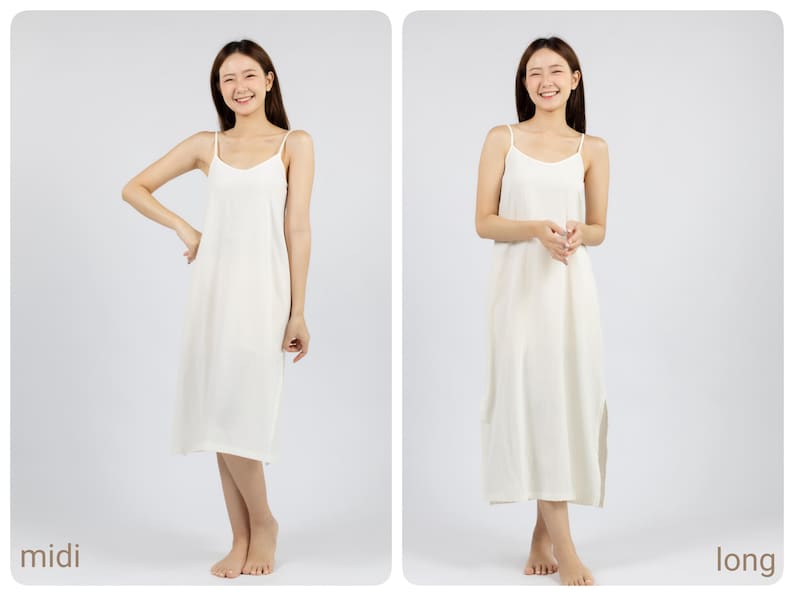 May include: Two white slip dresses, one midi length and one long length, are shown on two models. Both models are smiling and standing on a white background.