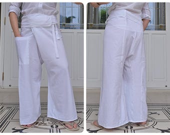 May include: White wrap pants with a wide leg and a tie at the waist. The pants are made of a lightweight fabric and have a relaxed fit.