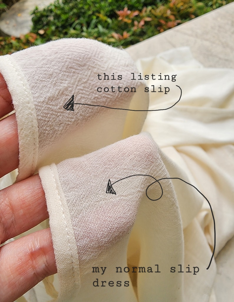 May include: Close-up of two pieces of white fabric. The top piece is labeled "this listing cotton slip" and the bottom piece is labeled "my normal slip dress".