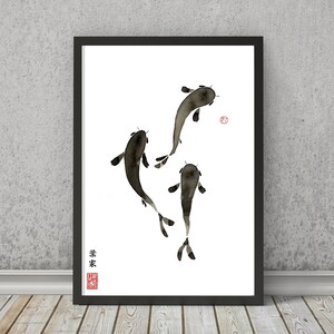 May include: A black and white ink painting of three koi fish swimming in a white background. The painting is framed in a black frame. The artist's signature is in the bottom left corner.