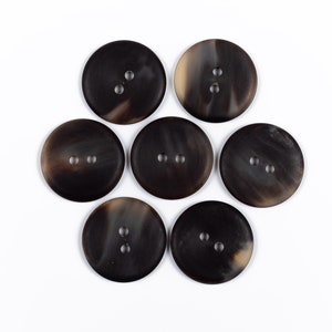 Horn buttons / size 11-50 mm. / 2 holes