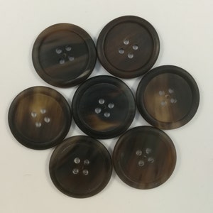 Brown Horn buttons with rim /10-28 mm./ 4 holes