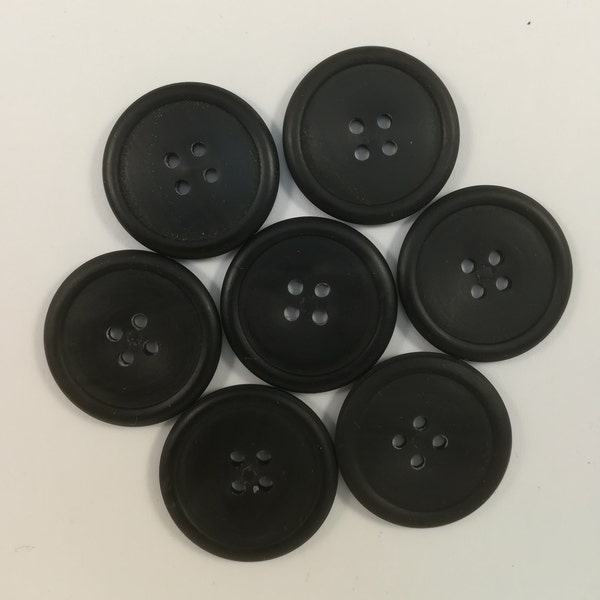 Horn buttons with rim/10-28 mm./ 4 holes Black button