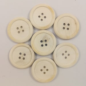 Horn buttons with rim/ 10-28 mm./ 4 holes