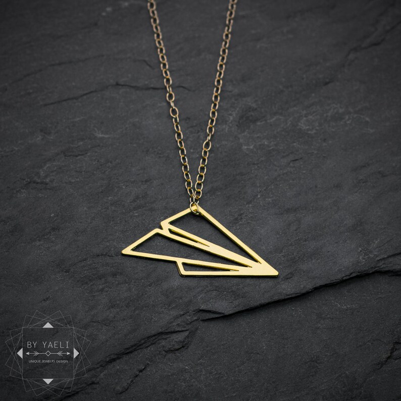 gold airplane necklace