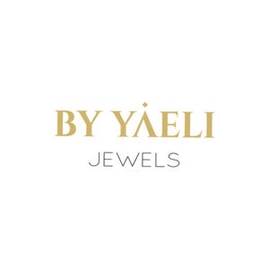 May include: Gold logo with the text "BY Y&Auml;ELI JEWELS" in a serif font.