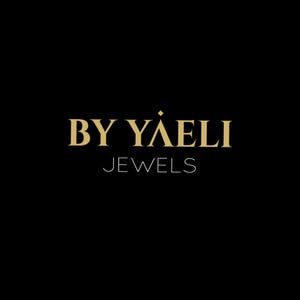 May include: Gold logo on a black background with the text "BY Y&Auml;ELI JEWELS".
