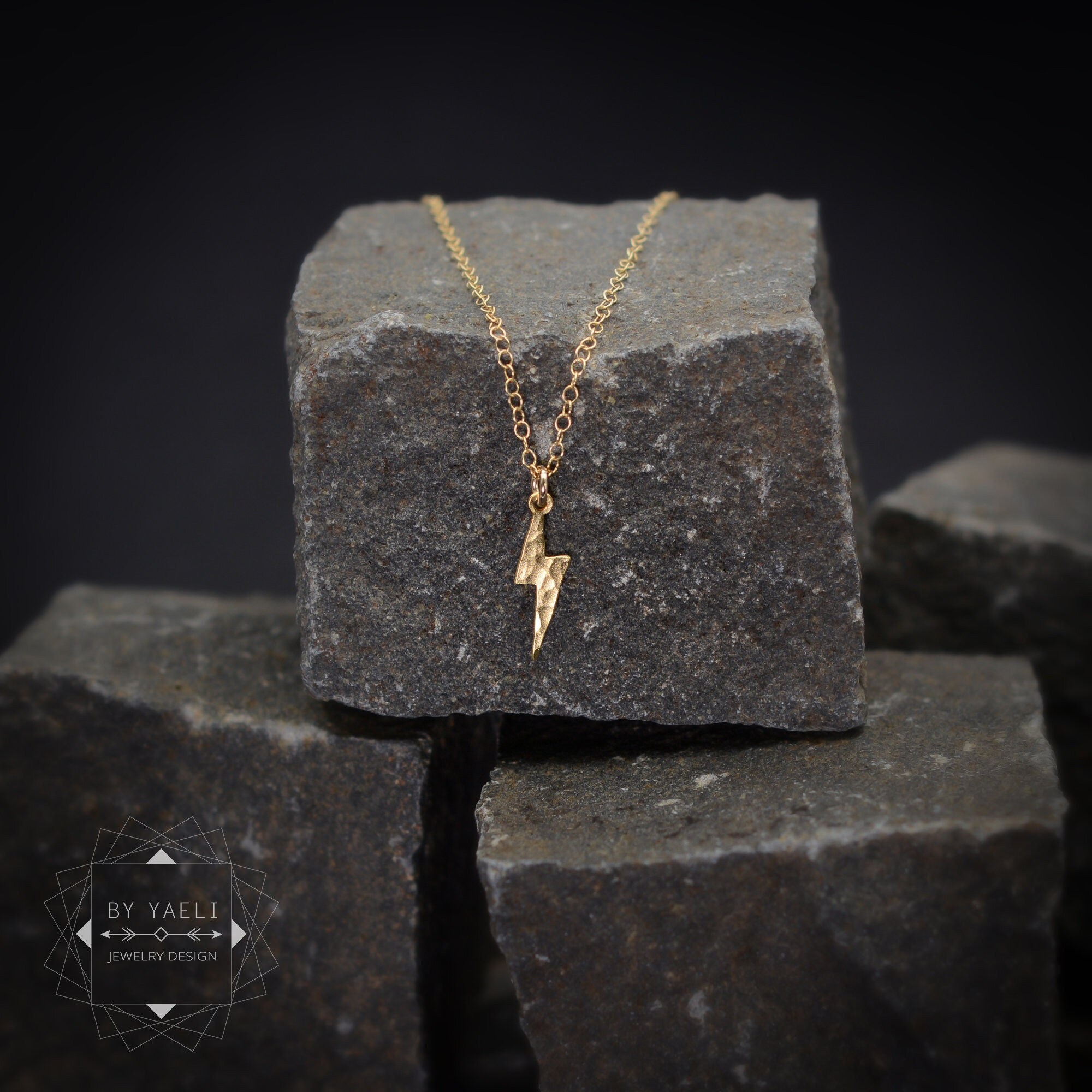 Gold lightning bolt best sale necklace