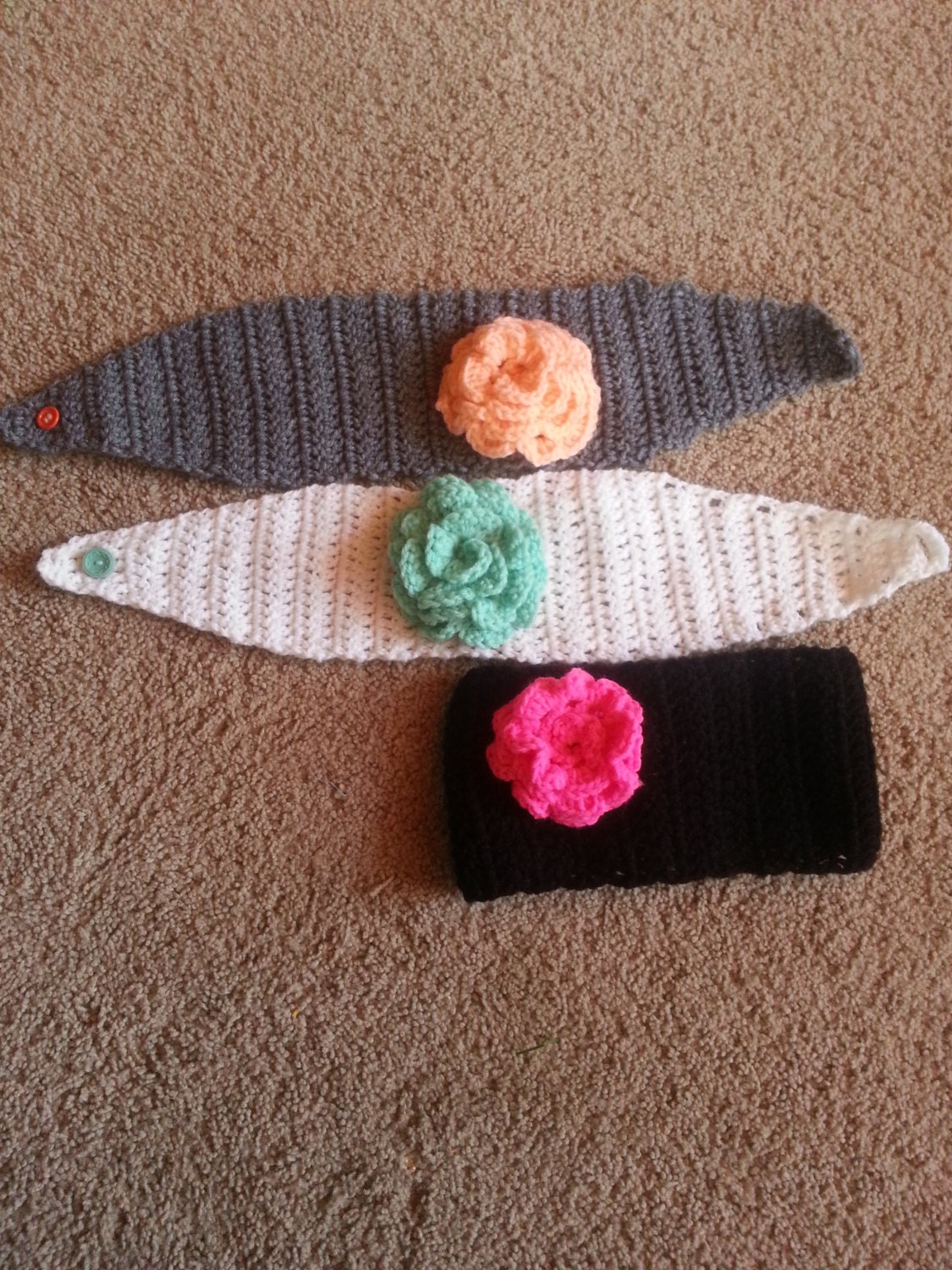 Crocheted ear warmer with crocheted flower | Etsy