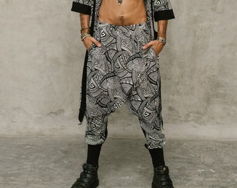 Pantalones harem tribales para hombre: pantalones de tiro bajo para festivales en blanco y negro.