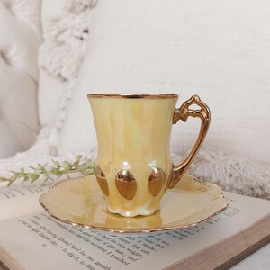 Mid Century Demitasse Cup and Saucer: Gold Trim, Ornate Handle