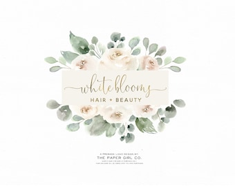 May include: A floral logo design featuring the text "white blooms HAIR + BEAUTY" in gold script on a cream-colored rectangle, surrounded by watercolor roses and greenery. The design is by The Paper Girl Co.