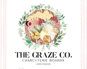 May include: A watercolor illustration of a round wooden charcuterie board topped with crackers, grapes, figs, and various cheeses, surrounded by green leaves. Text reads THE GRAZE CO. CHARCUTERIE BOARDS AMSTERDAM, with additional small print below.