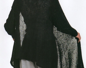 May include: A black, open-front cardigan with an asymmetrical hem. The long-sleeved sweater has a textured knit design with a contrasting open weave panel on the sides. The model is wearing gray pants and a white collared shirt.