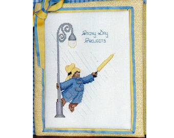 Paddington Bear che canta sotto la pioggia schema punto croce orso con ombrello schema punto croce PDF download immediato