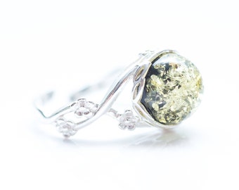 green amber rings in silver