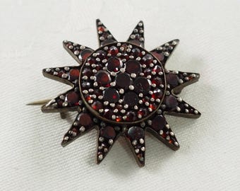 Antique Victorian  Period Bohemian Garnet 12 Pointed Star Brooch, set in Tombak or Pinchbeck, January Birthstone, Bohemia circa 1890