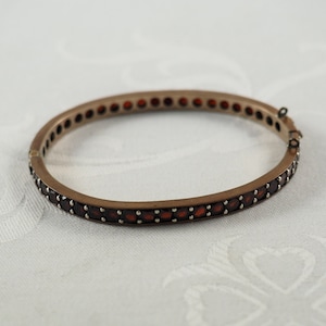 Antique Edwardian Bohemien Garnet Hinged Bangle  in Tombak, Single Row 45 Garnets each 3.5mm in Diameter, January Birthstone,, Bohemia 1900