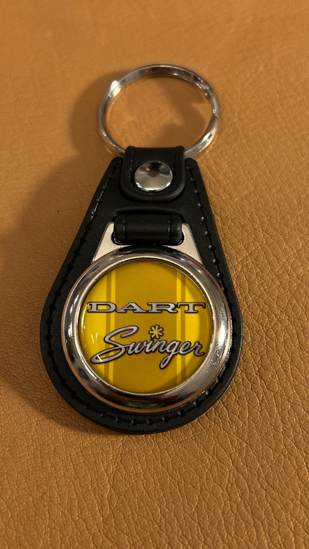 Yellow DART SWINGER KEYCHAIN Black Back - Etsy
