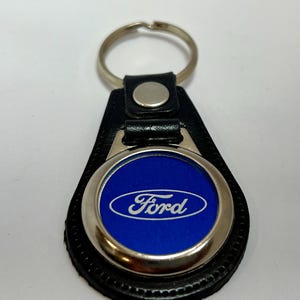 Special order for Kiss Balázs black leather with blue & white engraved logo