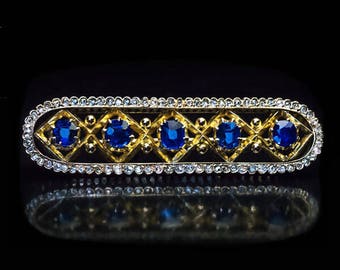 絶妙なアンティークサファイアブローチ。時代を超えた優雅さを極めた