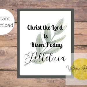 Könnte beinhalten: Druckbarer Kunstdruck mit einer Aquarell-Illustration eines grünen Zweigs mit Blättern. Der Text lautet "Christ the Lord is Risen Today Halleluia" mit einem gelben Aquarellhintergrund unten mit dem Text "Yellow Parasol Designs".