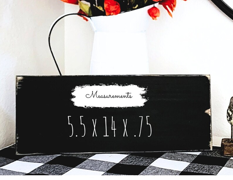 Puede incluir: Un letrero de madera negro con texto blanco que dice "Measurements 5.5 x 14 x .75".