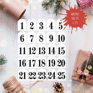 May include: White gift tags with black numbers 1 through 25. The tags are arranged in five rows of five. The text "ADVENT TAG SET 1-25" is written in red on a white background.