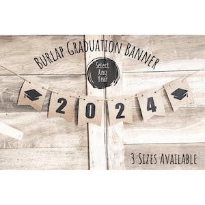 May include: A burlap banner with the year 2024 printed on it. The banner is decorated with graduation caps and the text "Burlap Graduation Banner" and "Select Any Year". The banner is available in three sizes.