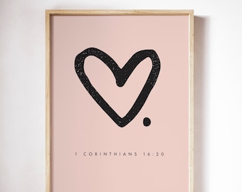 May include: A pink framed print with a black hand-drawn heart and the text "1 Corinthians 16:20".