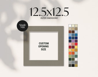 May include: A square, single mat with a neutral gray frame. The outer dimensions are 12.5 x 12.5 inches. The mat has a white interior with the text "CUSTOM OPENING SIZE". A color chart is displayed to the right.