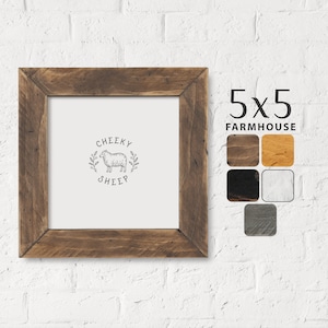 May include: A rustic wooden frame with a white background and a black and white illustration of a sheep with the text "CHEEKY SHEEP". The frame is 5x5 inches and is labeled "FARMHOUSE".