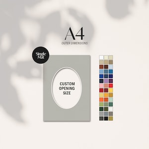 May include: A4-sized single mat with a custom oval opening. The mat is light gray with white interior. Text on the mat reads "Custom Opening Size." A color chart with various hues is displayed to the right.