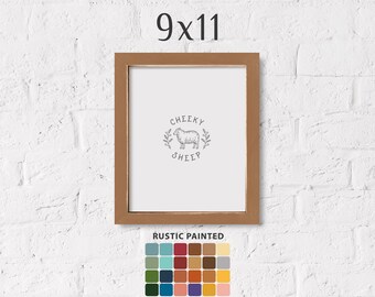 May include: A rustic painted 9x11 inch wood frame with a white background and a black and white illustration of a sheep with the text "Cheeky Sheep".