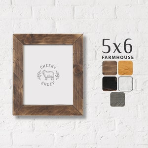 May include: A rustic wooden frame with a 5x6 inch opening, featuring a simple black and white illustration of a sheep with the text "Cheeky Sheep". The frame is available in a variety of wood stains, including brown, black, white, and gray.