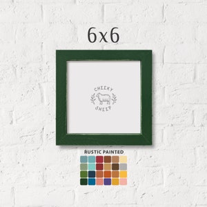 May include: A 6x6 inch green picture frame with a rustic painted finish. The frame has a white mat and a black and white illustration of a sheep with the text "CHEEKY SHEEP". The frame is shown against a white brick wall. A color palette of 25 colors is shown below the frame.