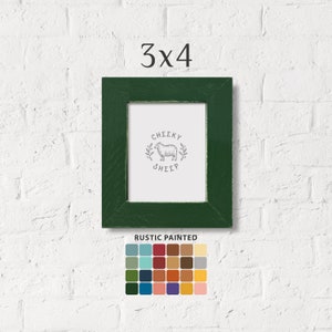 May include: A 3x4 inch rustic green picture frame with a white mat and a black and white illustration of a sheep with the text "Cheeky Sheep". The frame is shown against a white brick wall. A color palette of 36 colors is shown below the frame.