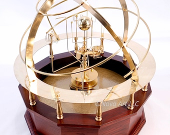 Grand Orrery in beautiful semi-precious stone, hardwoods, brass. Correct relative motion of 9 planets