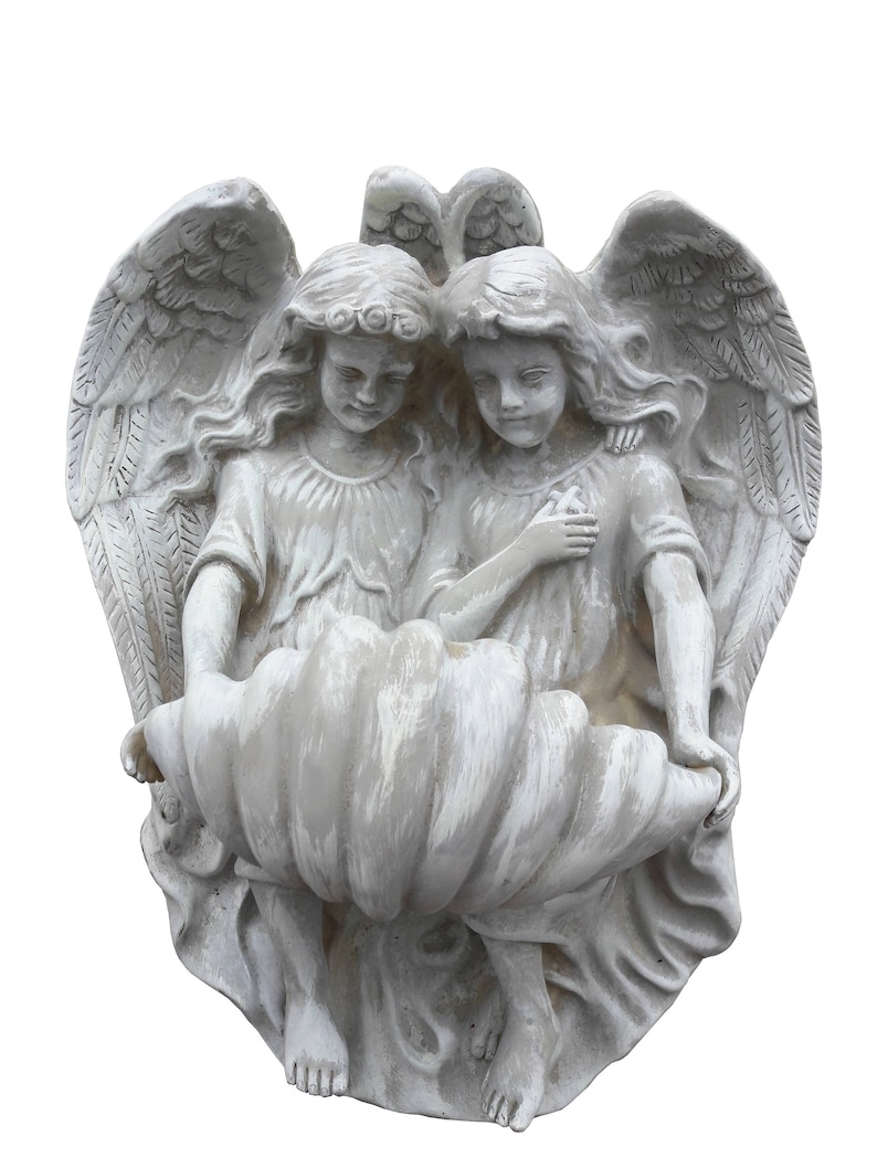 May include: Two white cherub angels with wings, holding a large, white, seashell-shaped object. The angels are sculpted in a realistic style and have delicate features.