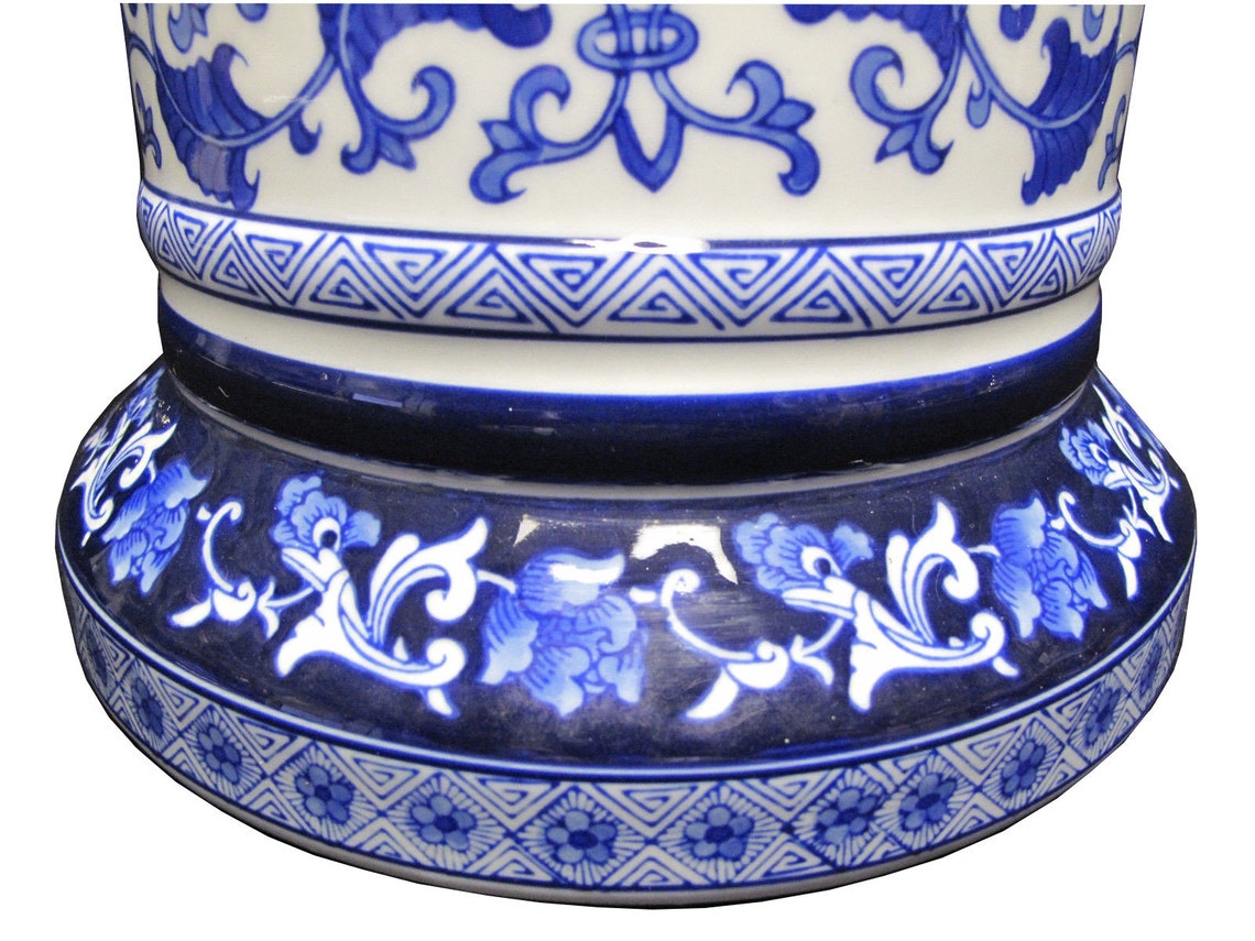 blue and white plant stand
