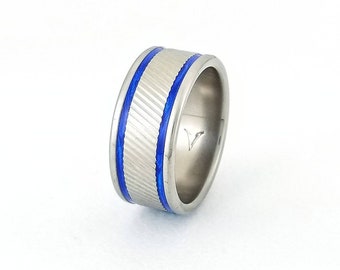 Serrated, Titanium ring. Two colored line inlays, Textured center, 9mm wide, Strong, Light Weight, Wedding Ring, Comfort fit, Polished.