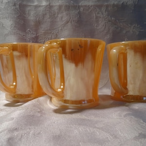 Set of 21 Peach Lustre Laurel Fire King Dinnerware Pieces by